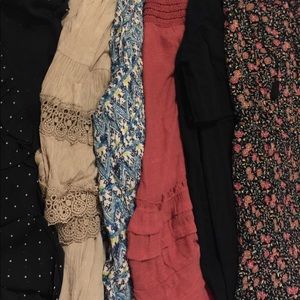 2 dresses and 4 tops.A mystery box with a hint !